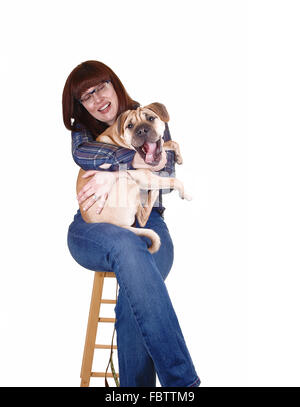 Woman holding dog. Banque D'Images