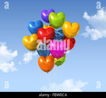 Ballons en forme de coeur de couleur sur un ciel bleu Banque D'Images