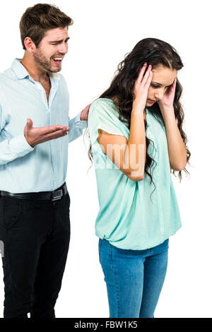 Unsmiling couple arguing Banque D'Images