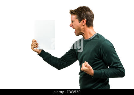 Angry Man holding document Banque D'Images