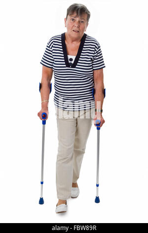 Senior woman on crutches Banque D'Images