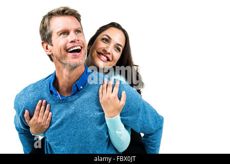 Man carrying girlfriend on retour Banque D'Images