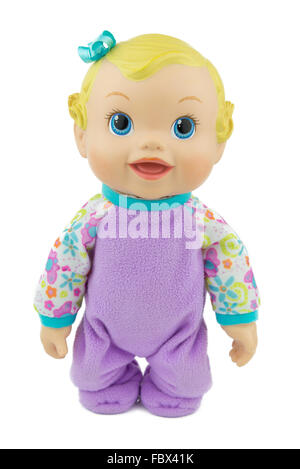 Baby Girl doll, assis sur isolent, bras de sensibilisation Banque D'Images