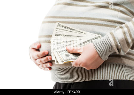 Pregnant woman holding en devises en dollar Banque D'Images