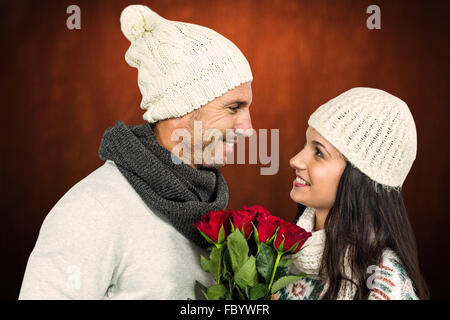 Portrait of woman holding bouquet de roses Banque D'Images