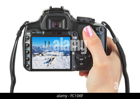 Appareil photo en main et d'hiver Autriche view Banque D'Images