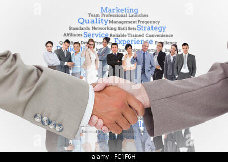 Composite image shaking hands Banque D'Images