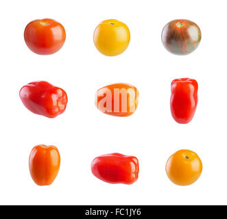 Tomates cerises multicolores isolé sur fond blanc Banque D'Images