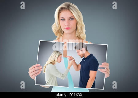Image composite de angry couple facing off durant les plaidoiries, Banque D'Images