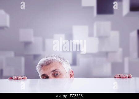 Image composite de businessman peeking plus de 24 Banque D'Images