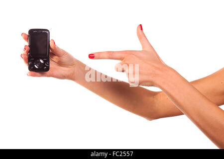 Main femme et téléphone mobile. Banque D'Images