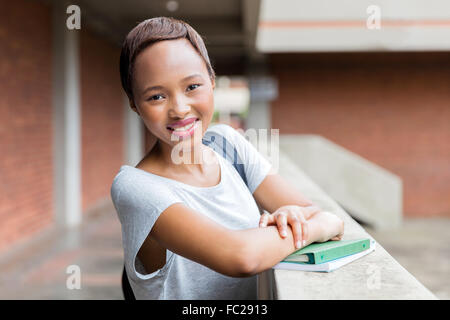 Cute African college Girl standing by adoption Banque D'Images