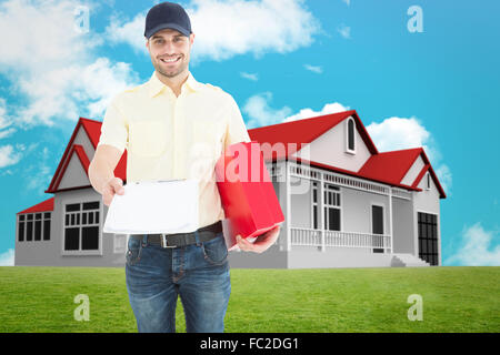 Image composite de l'homme de courrier avec boîte rouge donnant le presse-papiers Banque D'Images