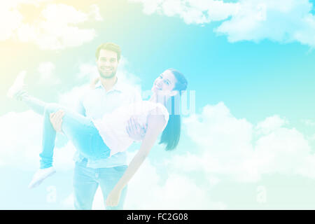 Image composite de l'attractive young couple having fun Banque D'Images