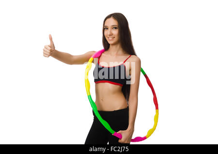 Une fille dans le sport costume avec hula hoop isolated on white Banque D'Images