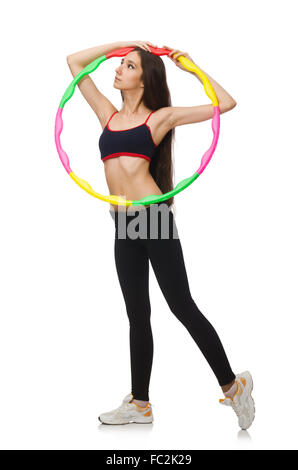 Une fille dans le sport costume avec hula hoop isolated on white Banque D'Images