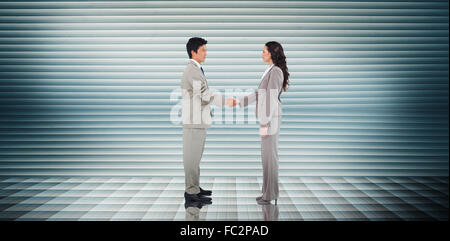 Image composite de business people shaking hands Banque D'Images