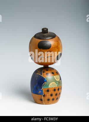 Kokeshi poupée Japonaise Vintage en bois. L'homme, peint à la main avec un signe de tête. Banque D'Images