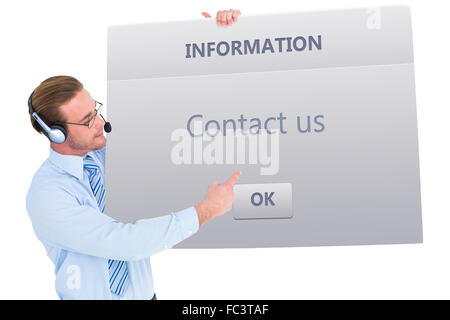 Composite image of businessman wearing headset carte présentation Banque D'Images
