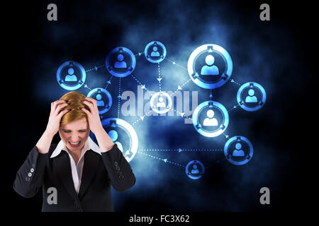 Composite image of businesswoman with hands on her head Banque D'Images