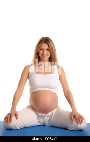 Pregnant woman sitting Banque D'Images