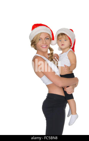 Des vêtements pour la famille et de remise en forme Santa hats Banque D'Images