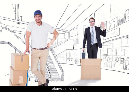 Composite image of delivery man leaning on trolley de boîtes Banque D'Images