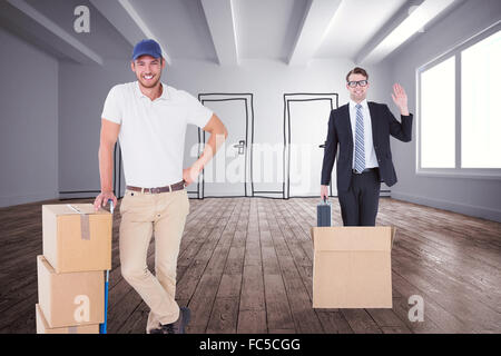 Composite image of delivery man leaning on trolley de boîtes Banque D'Images