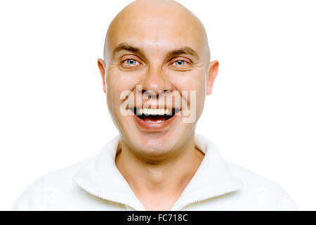 Bald smiling blue-eyed man. Studio isolé. Banque D'Images