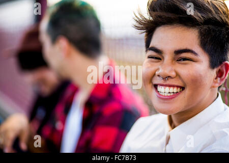 Close up of woman laughing outdoors Banque D'Images