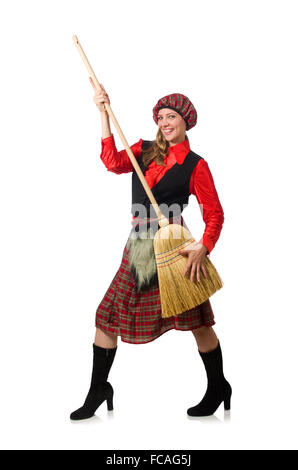 Femme drôle en vêtements écossais avec broom Banque D'Images