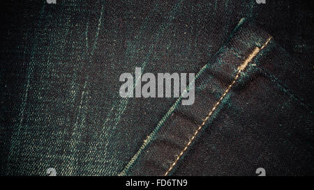 Closeup détail de dark blue denim jeans trouses , texture background Banque D'Images