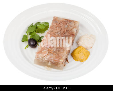 Partie de l'aspic d'assaisonnements de boeuf sur plaque blanche isolé sur fond blanc Banque D'Images