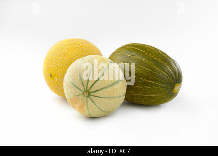 Trois melons frais sur fond blanc Banque D'Images