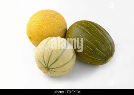 Trois melons frais sur fond blanc Banque D'Images