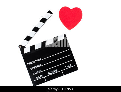 Movie clapper board et coeur rouge isolé sur fond blanc Banque D'Images