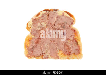 Pate ferme sur une tranche de pain grillé au beurre blanc isolé contre Banque D'Images