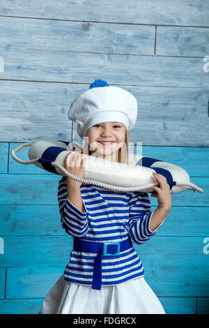 Girl wearing life preserver Banque D'Images