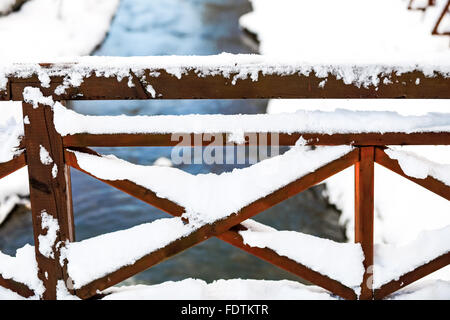 part of the bridge railing near mountain river Banque D'Images