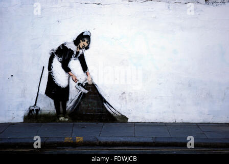 Femme de ménage à Londres par Banksy Banque D'Images