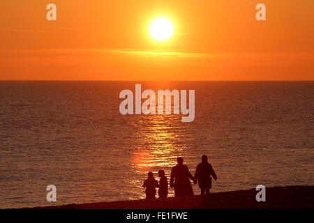 Golden coucher de soleil sur la plage de Brighton Banque D'Images