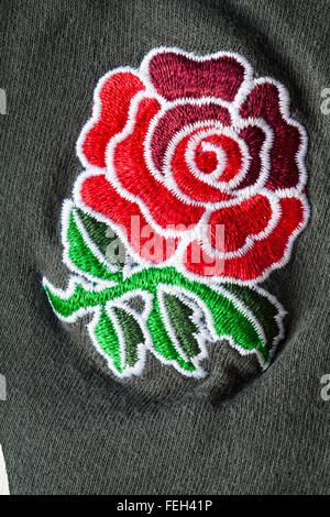 Logo Angleterre Rugby - logo Red rose cousu sur noir Angleterre Rugby officiel produit sous licence bébé pousser Banque D'Images