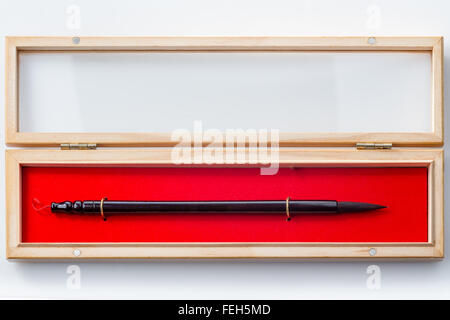 Pinceau calligraphie chinoise dans l'encadré sur fond blanc Banque D'Images