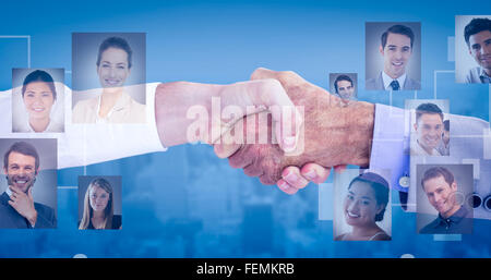 Image composite de business people shaking hands on white background Banque D'Images