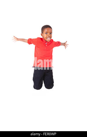 Portrait of a cute african american boy jumping, isolé sur fond blanc Banque D'Images