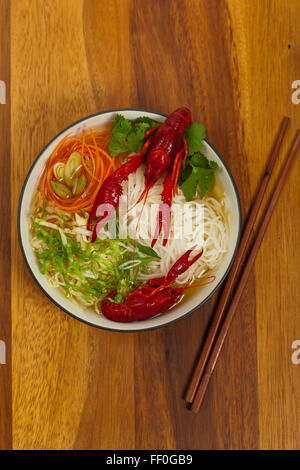 La langouste avec les nouilles de riz Banque D'Images