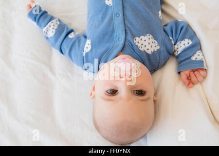 Caucasian baby girl with pacifier Banque D'Images