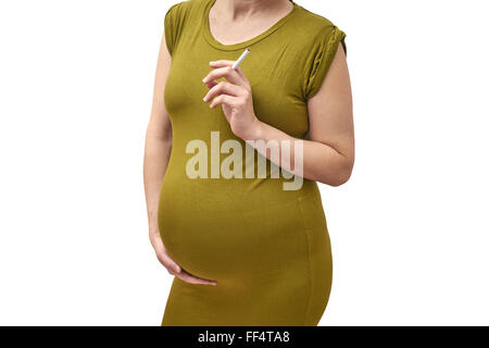 Close-up of pregnant woman is holding a cigarette Banque D'Images