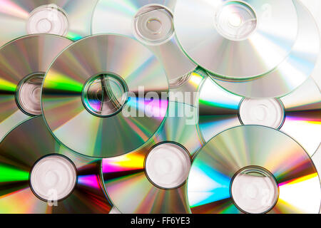Cd dvd cd dvd, stockage de données numérique disque piratage musique plein cadre de pile pile graver film studio d'information optique Banque D'Images