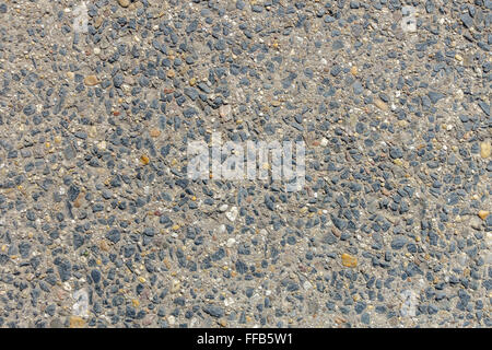 Texture d'une pierre en plein air floow fait de nombreux petites pierres en béton. Banque D'Images